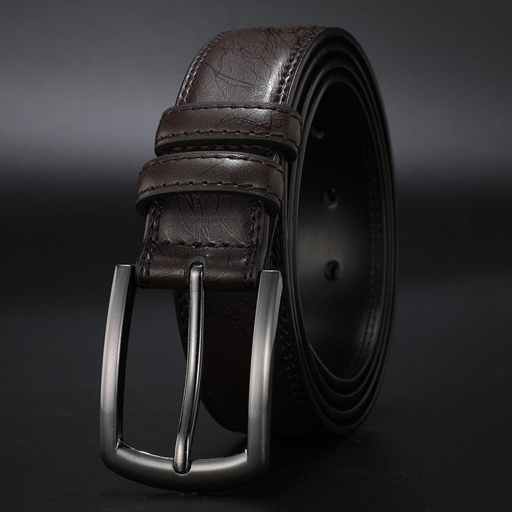 Zwarte heren riem met klassieke zilveren pin gesp. Geschikt voor herenmode, zakelijk en casual.