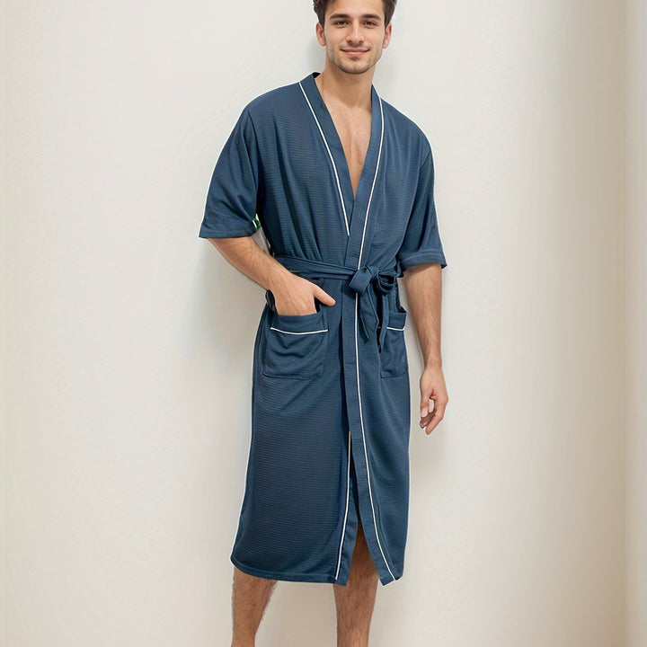"Stijlvolle herenbadjas Noah met korte mouwen, dubbele zakken en modern design in effen kleur voor dagelijks comfort en stijl