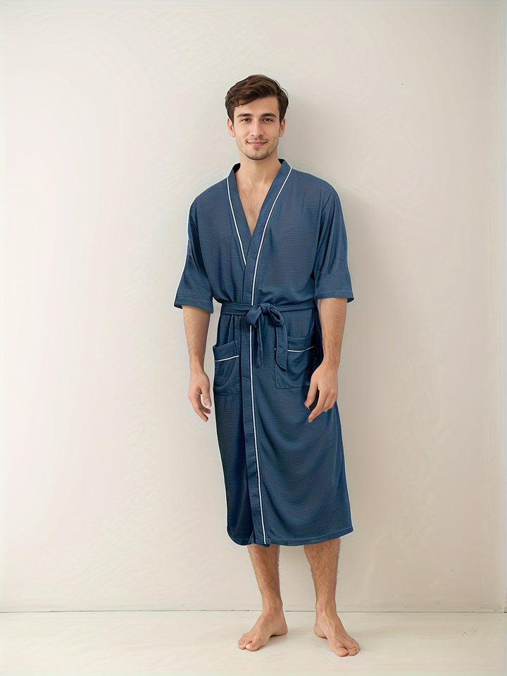 "Stijlvolle herenbadjas Noah met korte mouwen, dubbele zakken en modern design in effen kleur voor dagelijks comfort en stijl