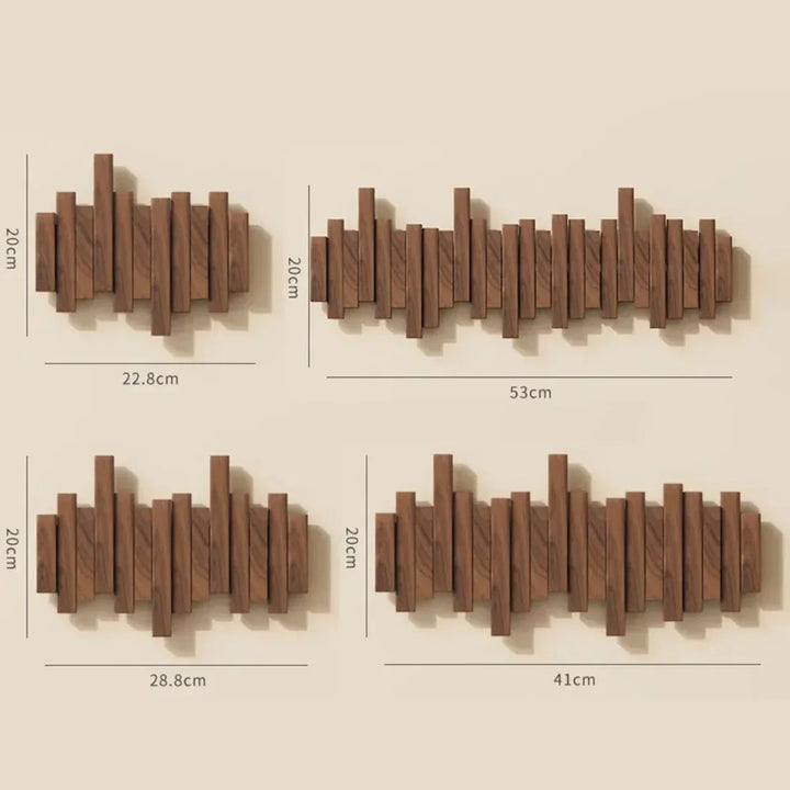 Minimalistische houten kapstok van walnoot- en beukenhout, geïnspireerd op een piano, voor modern interieur.