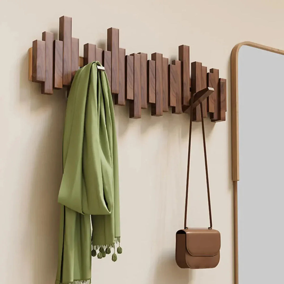 Elegante houten piano kapstok van walnoot en beukenhout als decoratief en functioneel opbergsysteem in uw hal.