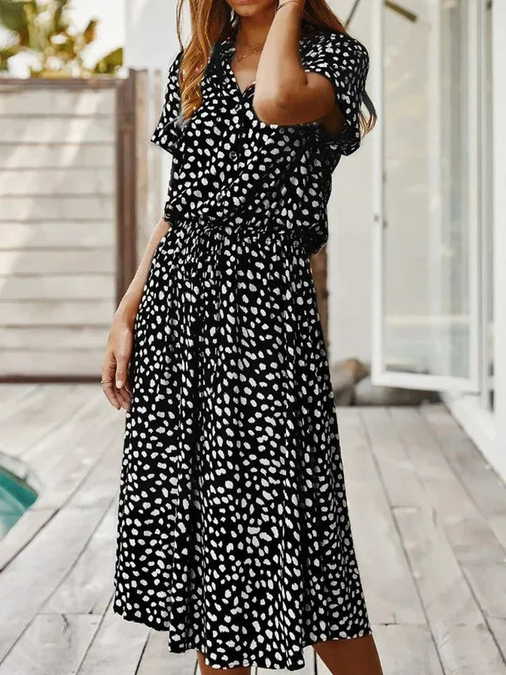 Midi dames jurk met korte mouwen, trendy zomerjurk voor een comfortabele look.