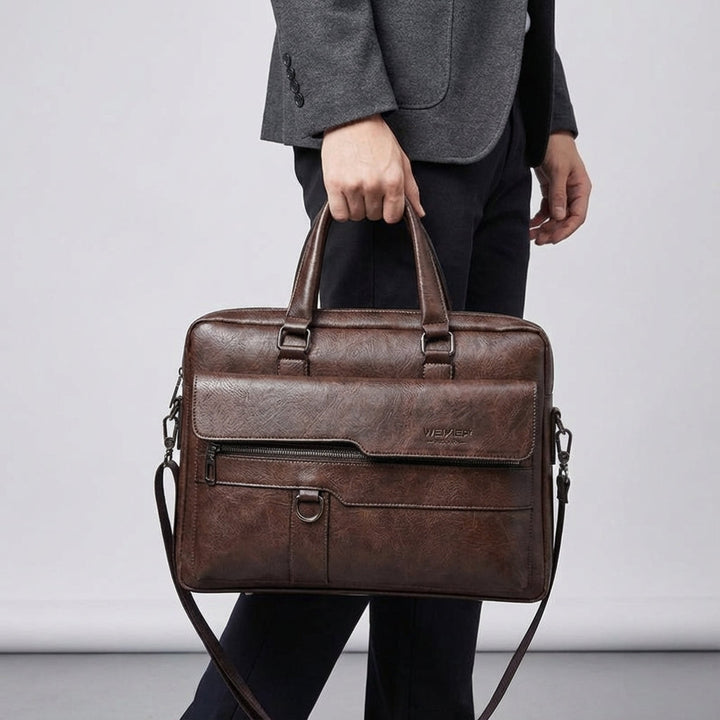 Zakelijke aktetas MetroBrief van PU leer, geschikt voor laptops. Comfortabele schoudertas voor dames en heren.