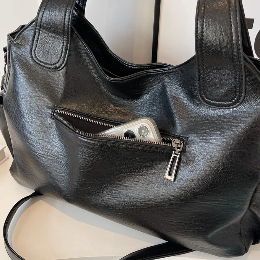 Stijlvolle Reid schoudertas voor dames, ideaal voor dagelijks gebruik met veel opbergruimte en een trendy design.
