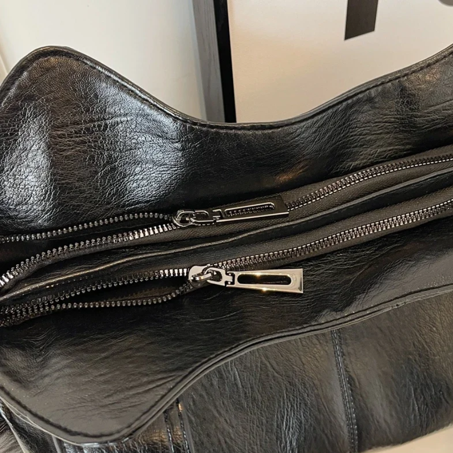 Stijlvolle Reid schoudertas voor dames, ideaal voor dagelijks gebruik met veel opbergruimte en een trendy design.