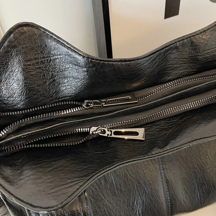Stijlvolle Reid schoudertas voor dames, ideaal voor dagelijks gebruik met veel opbergruimte en een trendy design.