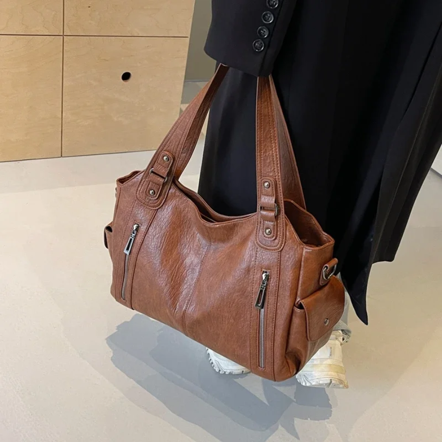 Stijlvolle Reid schoudertas voor dames, ideaal voor dagelijks gebruik met veel opbergruimte en een trendy design.