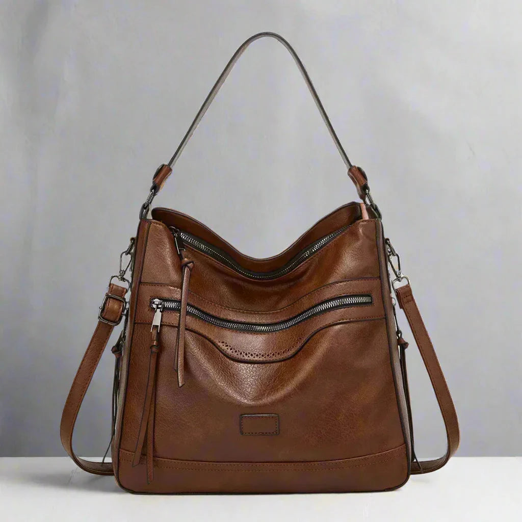 Stijlvolle retro leren tas voor dames in zwart, hoogwaardig leer, tijdloos design, veelzijdig voor dagelijks gebruik.