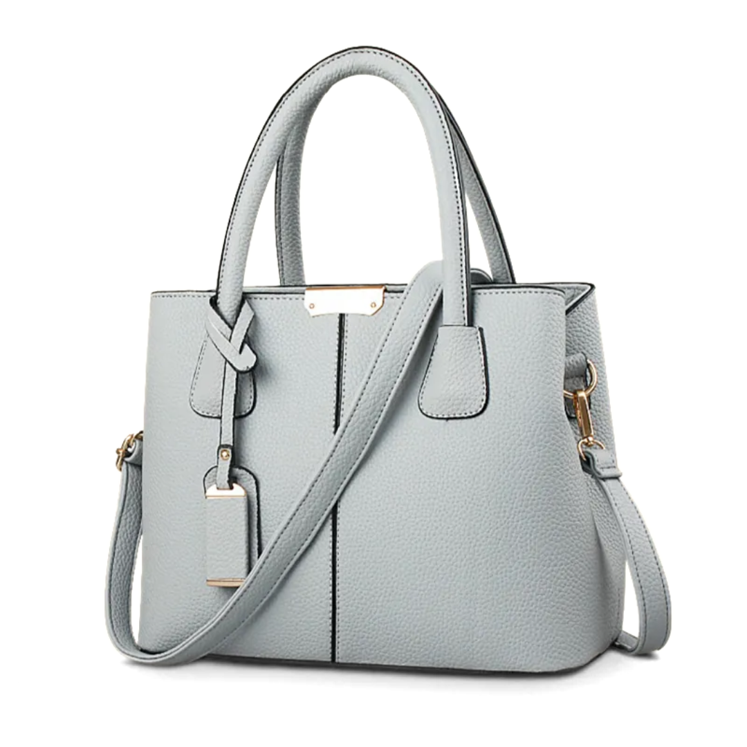 "Stijlvolle Romina Crossbody Draagtas in paars met strak, vierkant ontwerp en comfortabele band voor een elegante look."