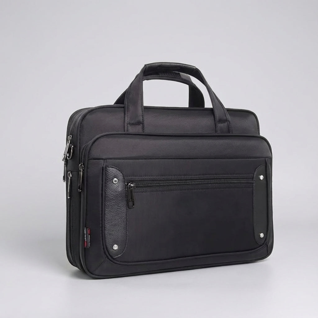 Ruime canvas laptoptas UrbanBrief, biedt bescherming en organisatie voor je laptop en accessoires onderweg.