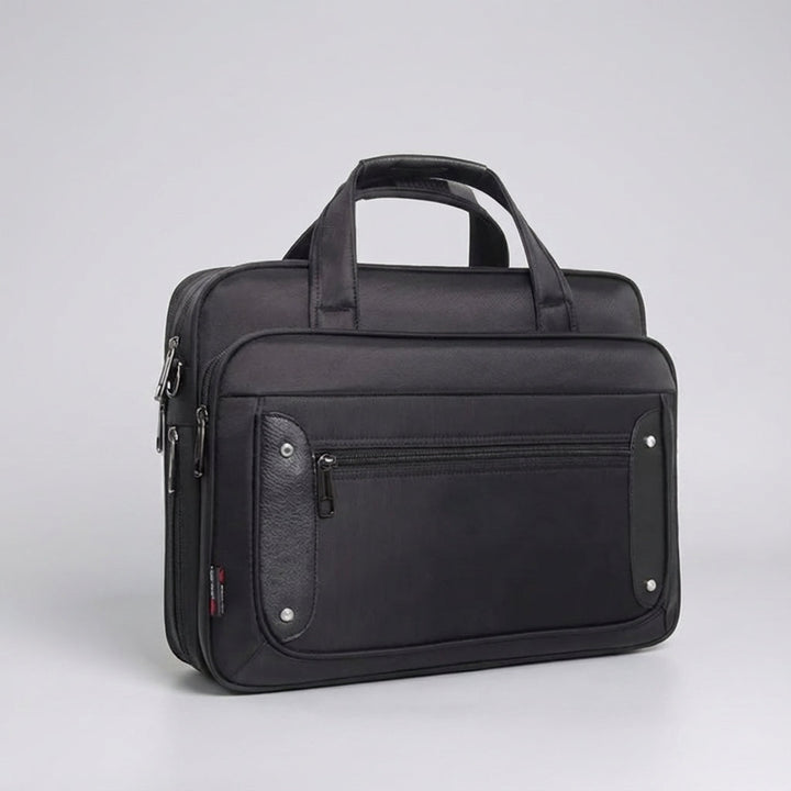 Ruime canvas laptoptas UrbanBrief, biedt bescherming en organisatie voor je laptop en accessoires onderweg.