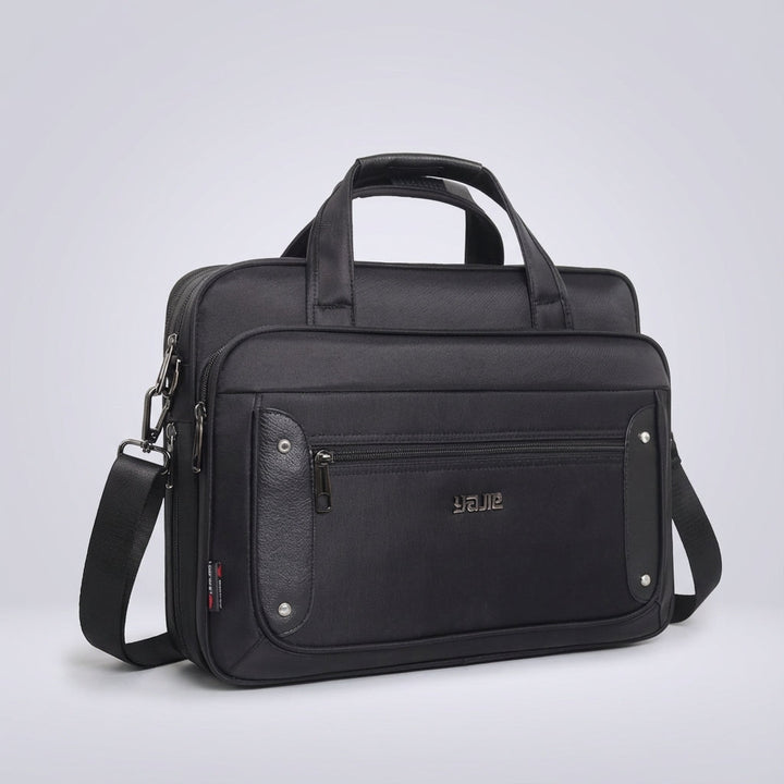 Grote UrbanBrief laptoptas van duurzaam canvas, een functionele werktas voor dagelijks gebruik en laptops.