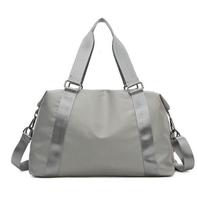 Ruime waterdichte gymtas Sterre voor dames, perfect als weekendtas of reistas. Sterk nylon.