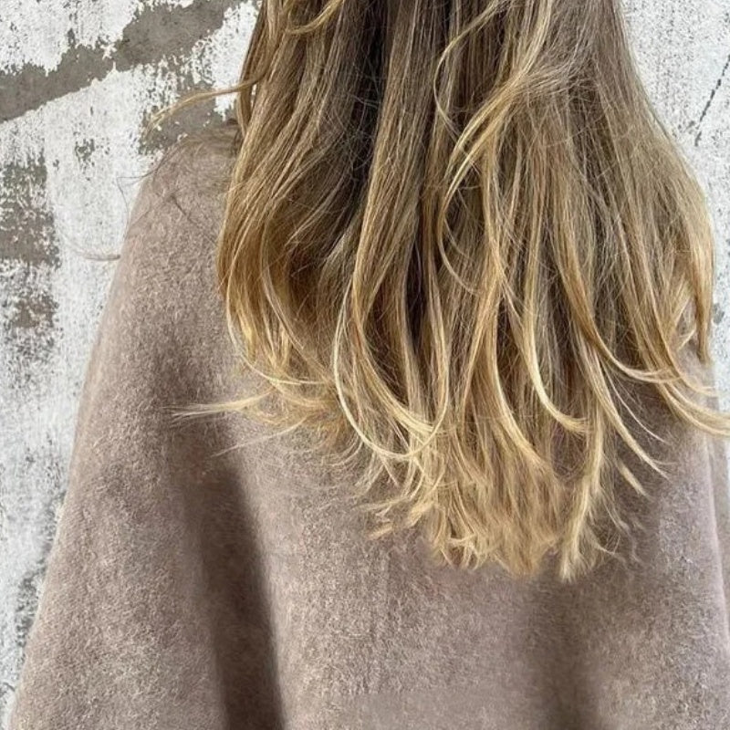 "Stijlvolle wolmix dames tussenjas in meerdere kleuren met harige textuur, oversized pasvorm en luxueuze uitstraling."