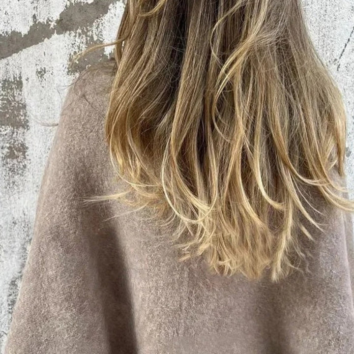 "Stijlvolle wolmix dames tussenjas in meerdere kleuren met harige textuur, oversized pasvorm en luxueuze uitstraling."