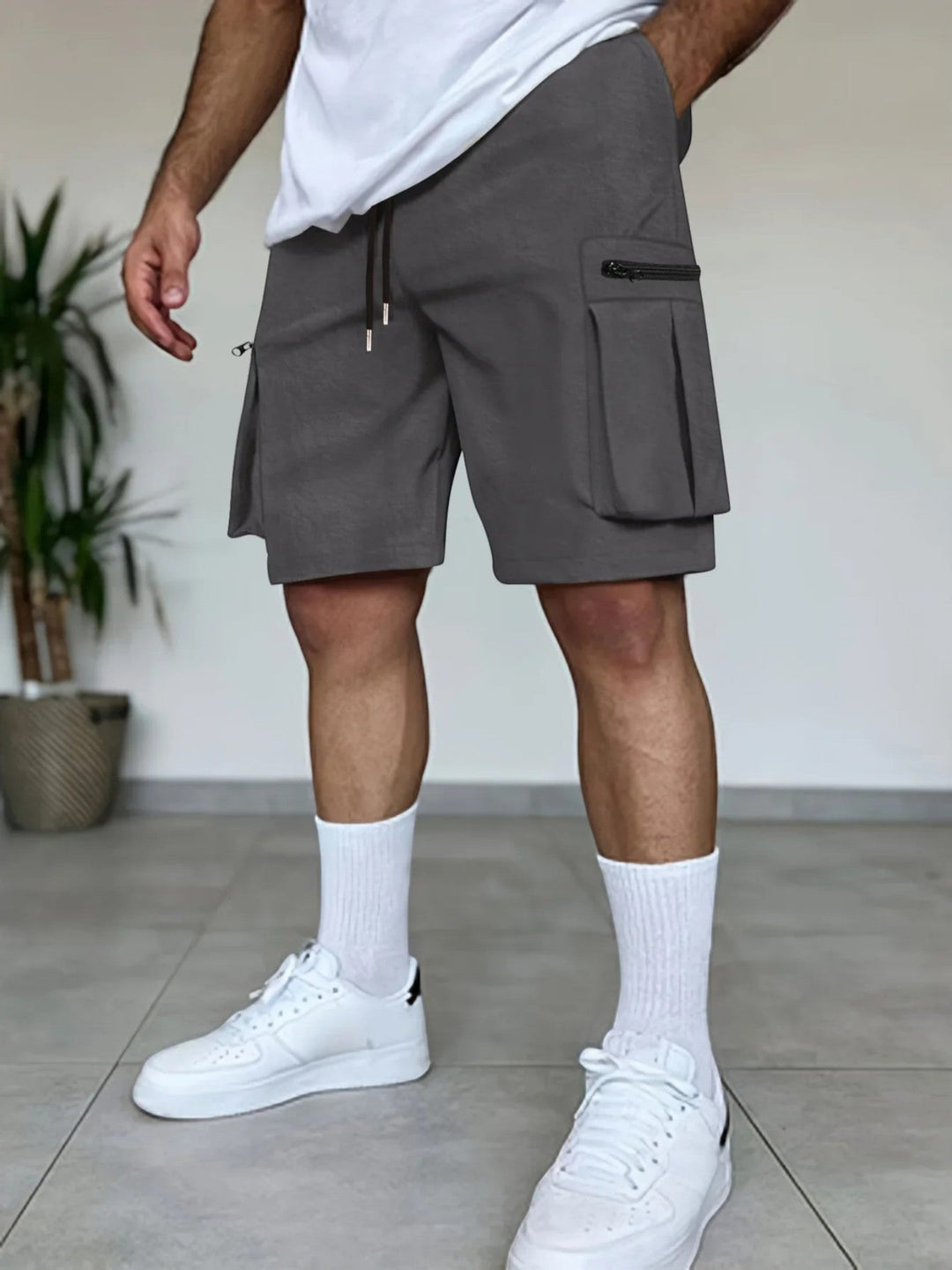 "Stoere lichtgewicht cargo shorts voor mannen, ademend katoenmix, meerdere zakken, ideaal voor zomeravonturen."