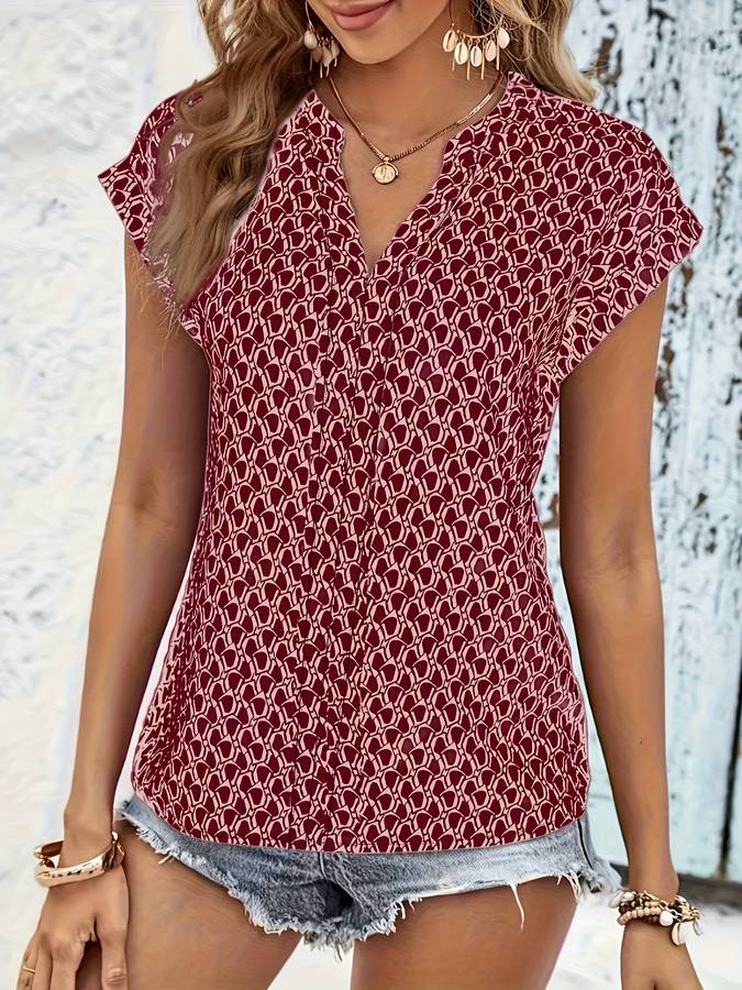 Elegante damesblouse, ideaal als zakelijke of casual blouse. Comfortabele en stijlvolle lente/zomer mode.