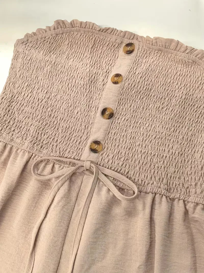 Dames playsuit met wijde pijpen, strapless design en gesmokt lijfje, stijlvolle zomerlook.