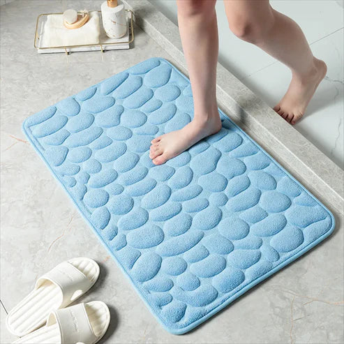 Onderhoudsvriendelijke machinewasbare badmat, sneldrogend en absorberend met anti-slip.
