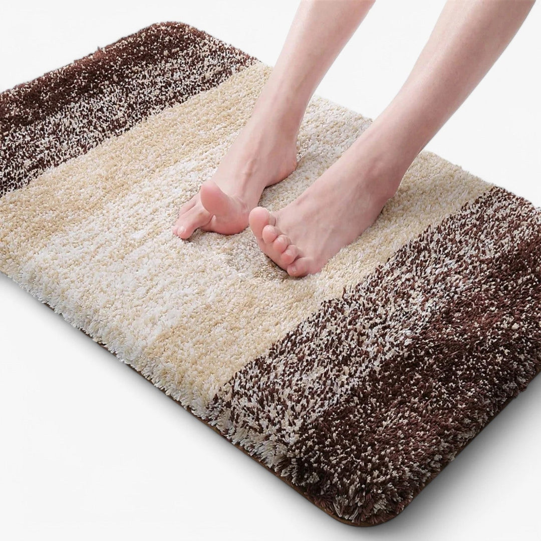 Zachte en pluizige badmat, biedt superieur comfort en veiligheid dankzij de antislip onderlaag.