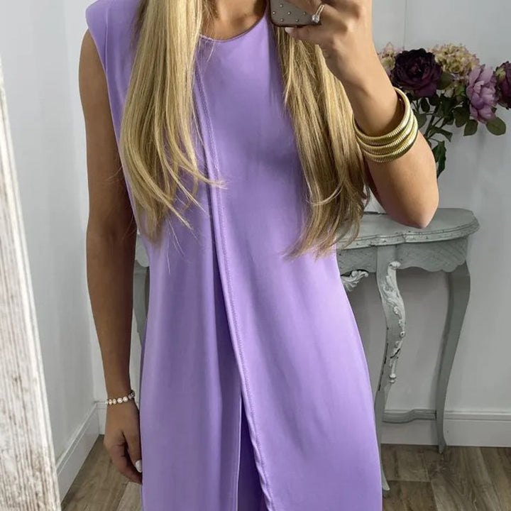 Sylvia tweedelige damesoutfit, elegante top en uitlopende broek, comfortabel en geschikt voor elke gelegenheid.