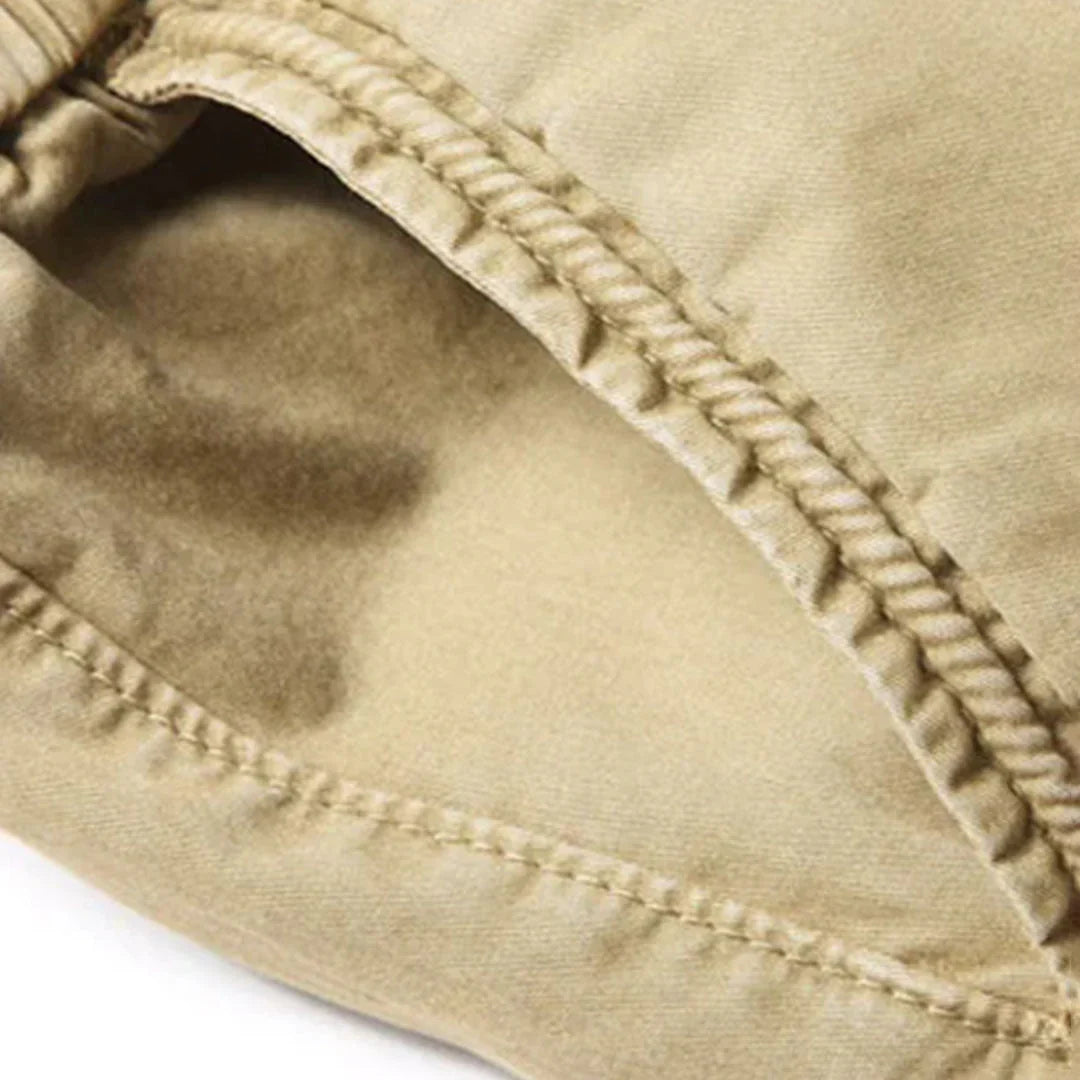 "Tactical cargo broek heren, duurzaam katoen, multifunctionele zakken, stoere streetwear stijl, comfortabele pasvorm."