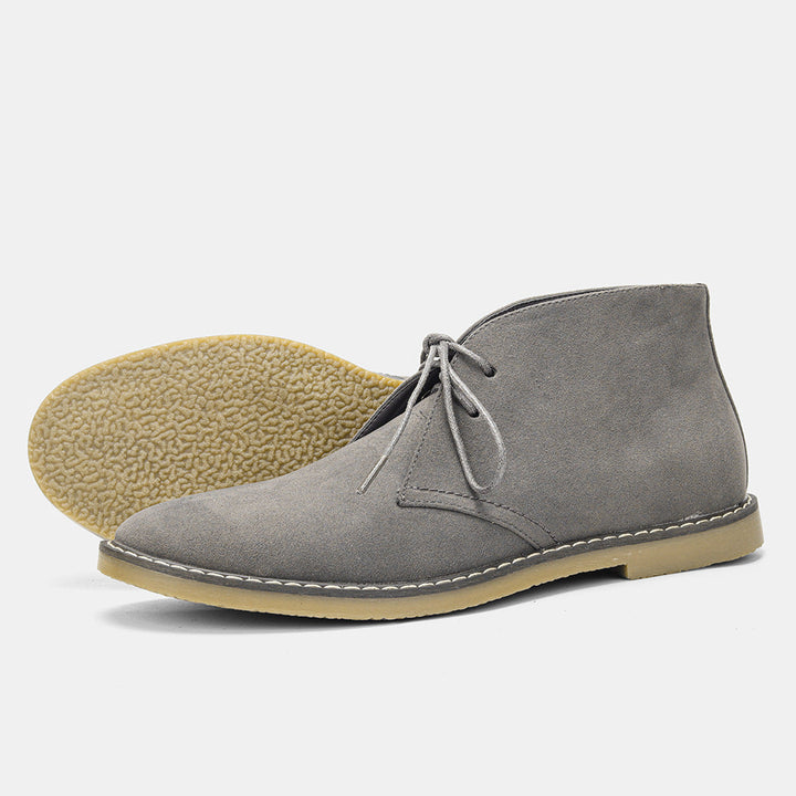 Tijdloze heren desert boots van hoogwaardig leer met vintage stijl en antislip zool, geschikt voor elke gelegenheid.