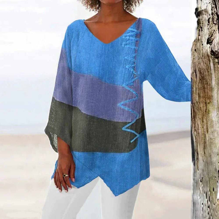 Casual lente dames blouse met trendy kleurblok dessin, V-hals en driekwart mouw. Stijlvol en veelzijdig.