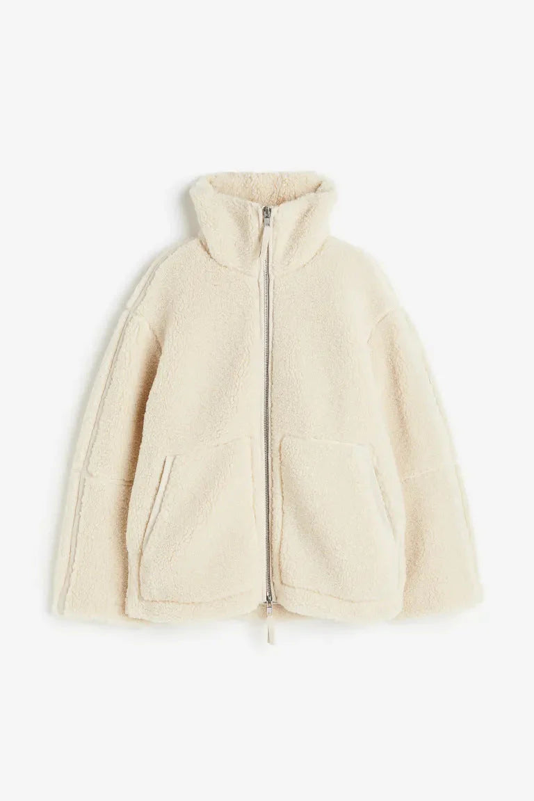 Casual dames teddy jas, perfect als trendy tussenjas met lange mouwen en handige zakken voor dagelijks gebruik.