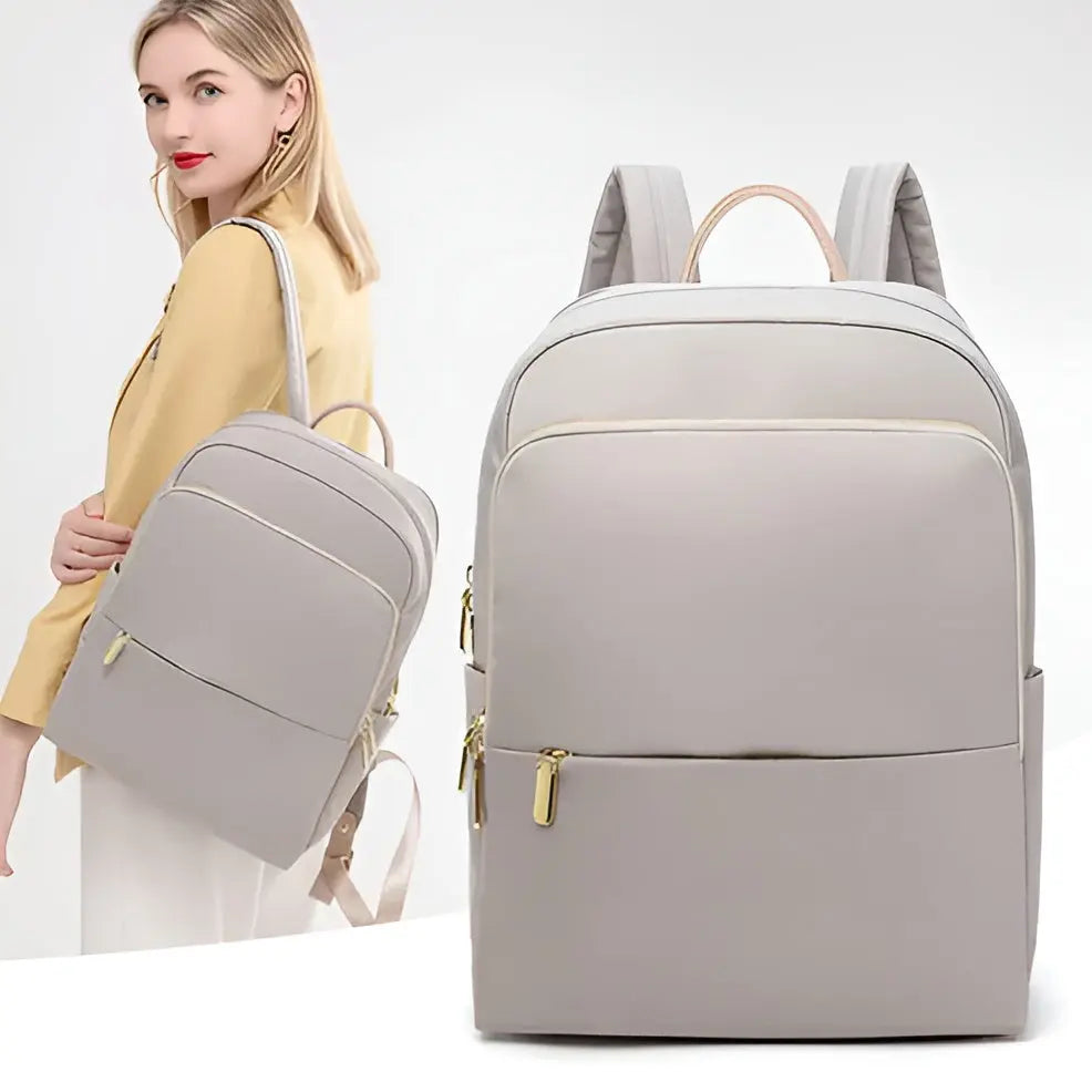 Trendy grijze Sophia damesrugzak, multifunctioneel en waterdicht, ideaal voor werk, school of casual gebruik.