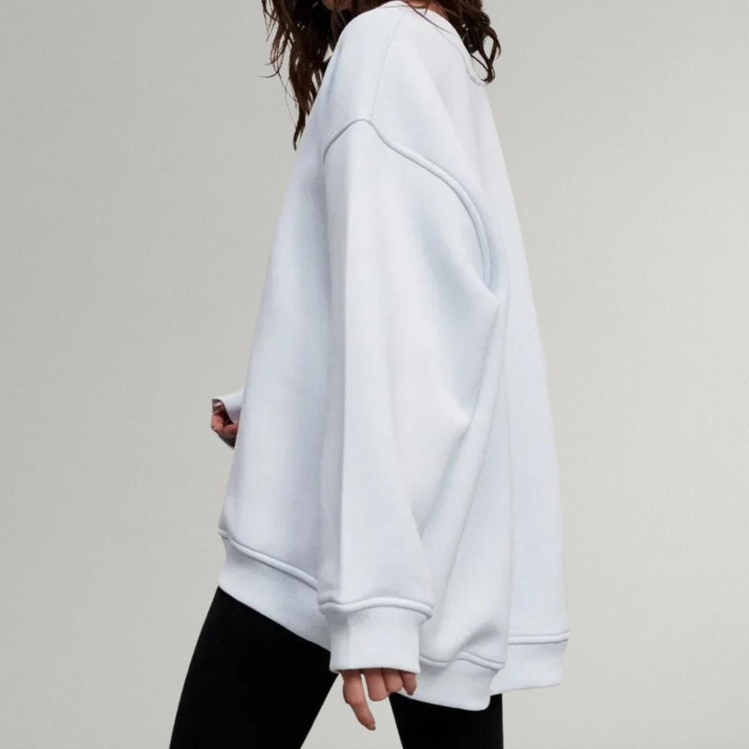 Dames oversized sweater in moderne kleur; comfortabel en casual, met ronde hals voor een trendy look.
