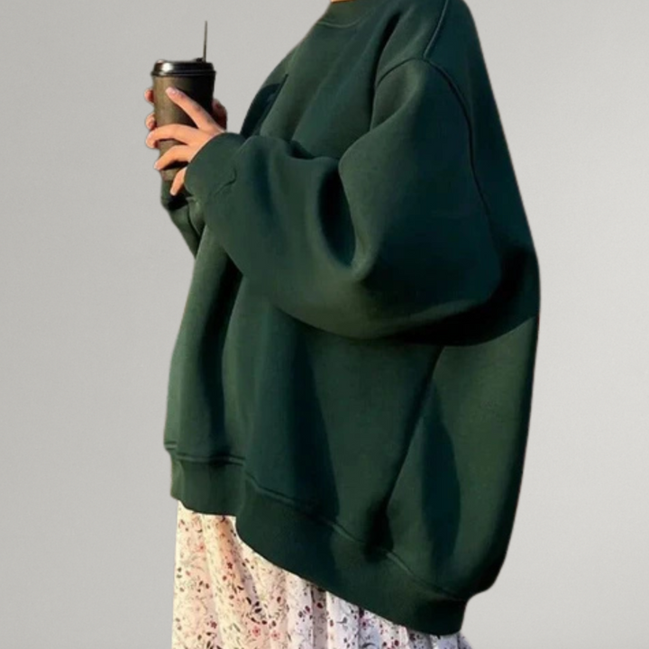 Warme oversized dames trui met lange mouwen; comfortabele losse pasvorm, essentieel voor winterkleding.