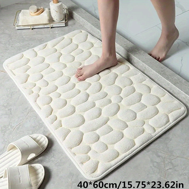 Functionele antislip badmat op tegelvloer, voorkomt uitglijden en houdt de badkamer droog en veilig.