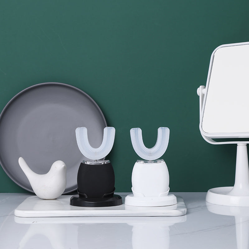 "Ultrasone 360° elektrische tandenborstel met witte siliconenborstels voor diepe sonische reiniging"