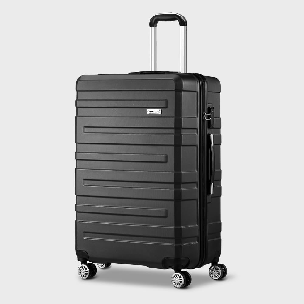 Een van de drie hard-shell spinner koffers, toont het robuuste exterieur en handvat.