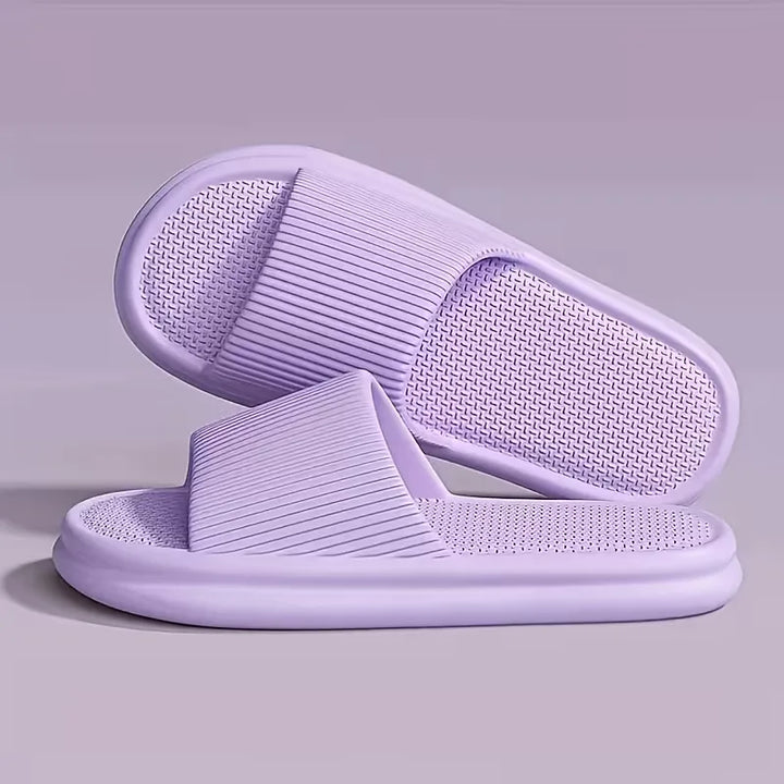 Comfortabele badslippers voor heren en dames, met een extra dikke zool voor ultiem loopcomfort.
