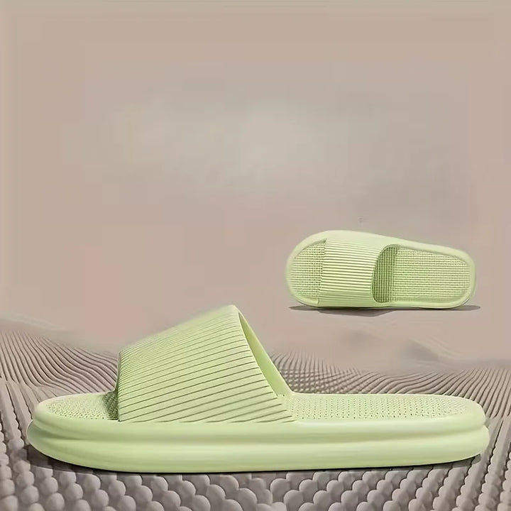 Veelzijdige unisex badslippers voor zomer, strand en thuis. Met dikke, ondersteunende zool.