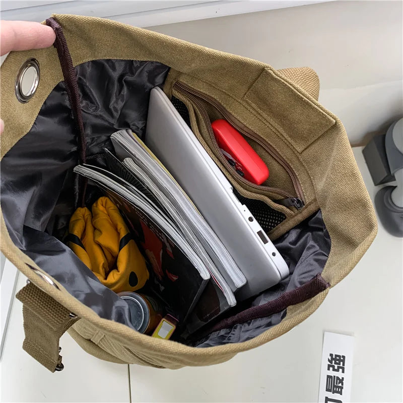 TrekMate canvas backpack: ruime en duurzame reistas voor avontuurlijke reizen, verkrijgbaar in meerdere kleuren.