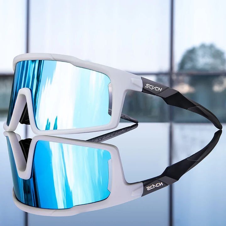 Stijlvolle unisex sport zonnebril, gepolariseerd met UV-bescherming. Perfect accessoire voor buitensport, met Gripsure pasvorm.