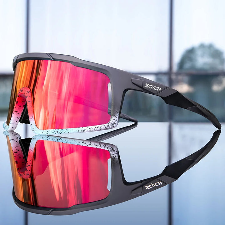 Duurzame unisex zonnebril met UV-bescherming en gepolariseerde glazen. Ontworpen voor sport, met een veilige Gripsure pasvorm.