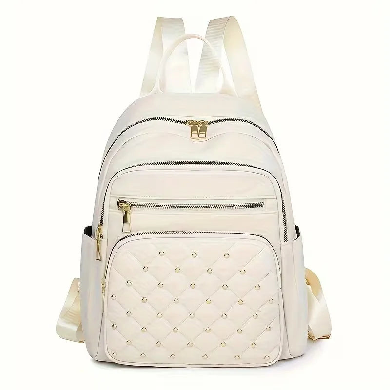 Trendy gewatteerde rugzak met studs voor unisex gebruik; perfect voor reizen, school en stijlvolle opbergruimte.
