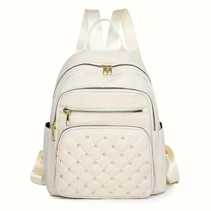 Trendy gewatteerde rugzak met studs voor unisex gebruik; perfect voor reizen, school en stijlvolle opbergruimte.