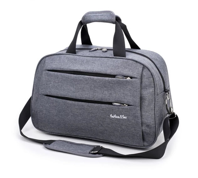 Compacte nylon reistas met handige trolleybevestiging, perfecte cabine tas voor reizen.