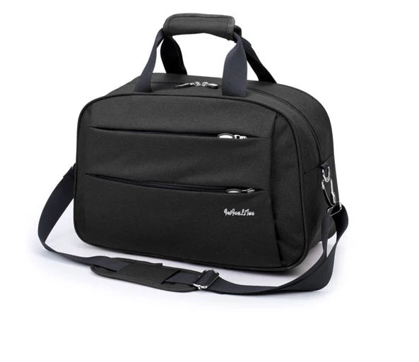 Zwarte reisbagage tas, multifunctioneel als schoudertas en handbagage trolleytas.