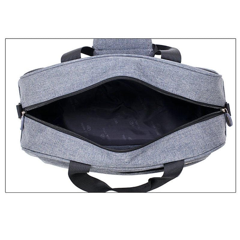 Compacte trolleytas van nylon voor handbagage, handig voor reizen en korte trips.