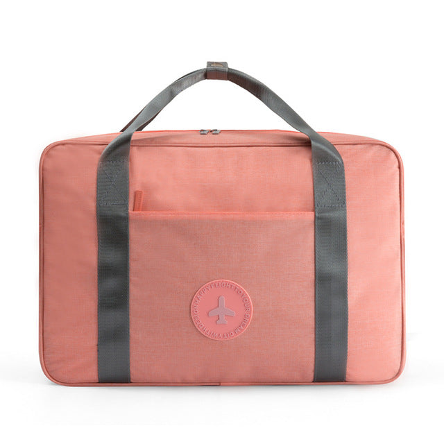 Lichtgewicht reistas met kofferbevestiging in grijs, biedt extra reisgemak als universele handbagage.