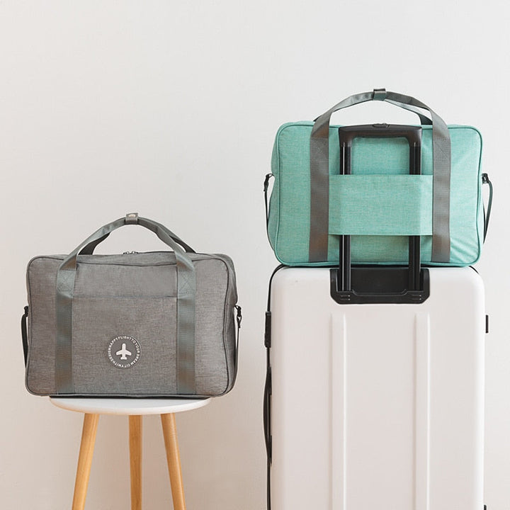 Praktische handbagage reistas voor optimaal reisgemak, met verstelbare schouderband en extra opbergruimte.