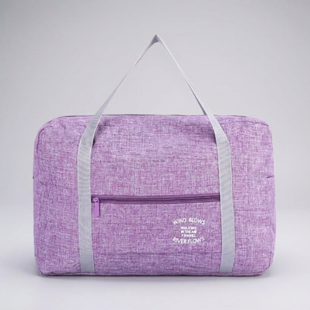 Opvouwbare Foldara reistas aan een trolley bevestigd, perfecte handbagage voor reizen.