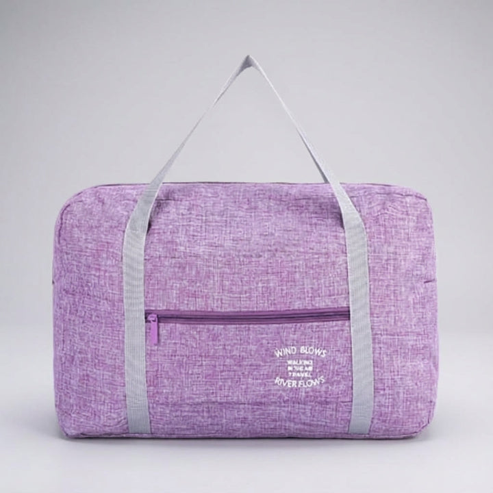 Opvouwbare Foldara reistas aan een trolley bevestigd, perfecte handbagage voor reizen.