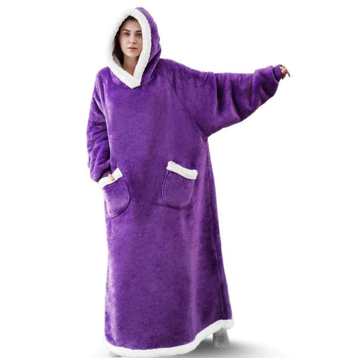 Ontspan in stijl met deze oversized unisex hoodiedeken, perfecte loungewear met capuchon en praktische zakken.